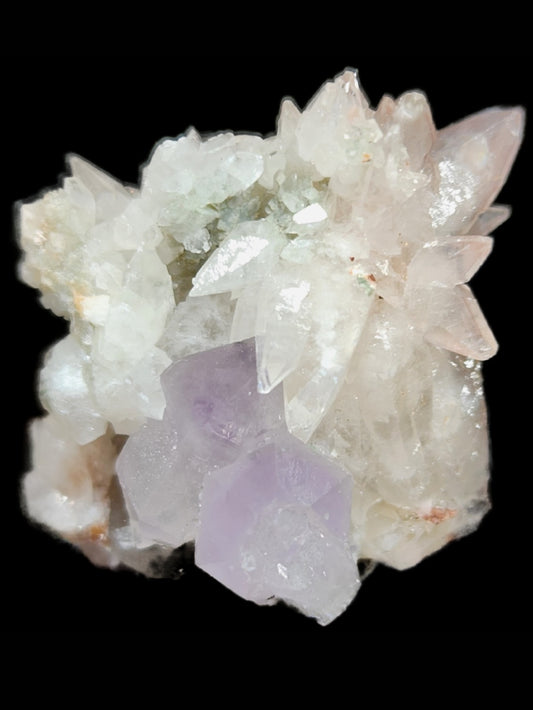 The Crystalary's Quartz v. Amethyst, Calcite from the Tonglushan Mine (SKU: 3101) showcases translucent crystals with sharp edges, mostly clear with some light amethyst hues. The black background accentuates their intricate and captivating natural beauty.