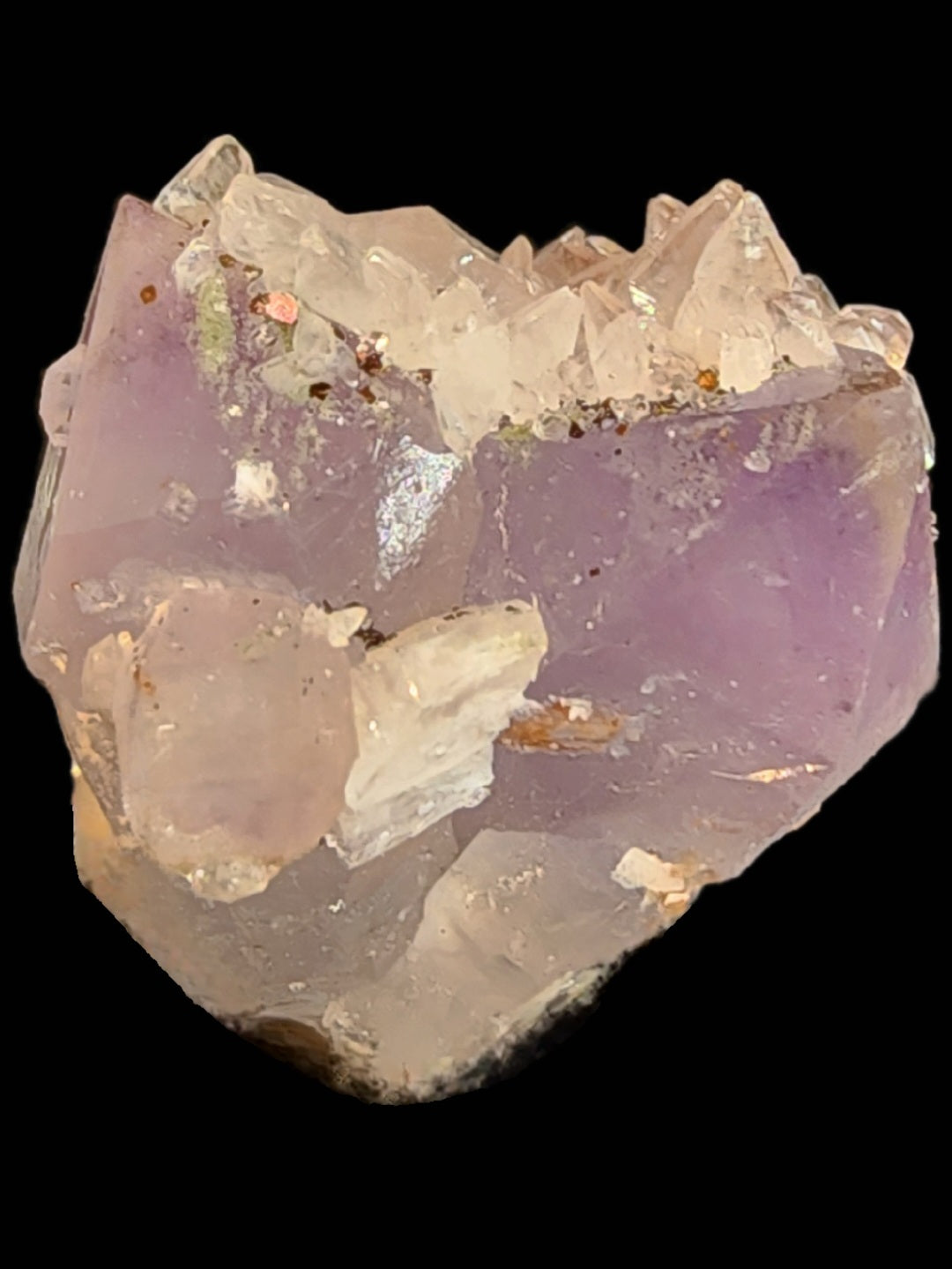 The Crystalary's Quartz v. Amethyst, Calcite from Tonglushan Mine (SKU 3102) features purple, clear, and white jagged crystalline formations with a rough texture, set against a plain black background to accentuate its natural beauty.