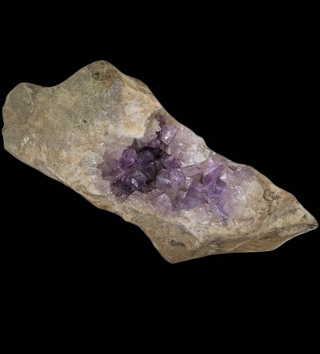 A Fluorite specimen from Jaimina Mine, Carrales, Obdulia vein, Asturias, Spain (sku 810) by The Crystalary features a cluster of crystals against a dark backdrop, evoking treasures from its renowned locality.