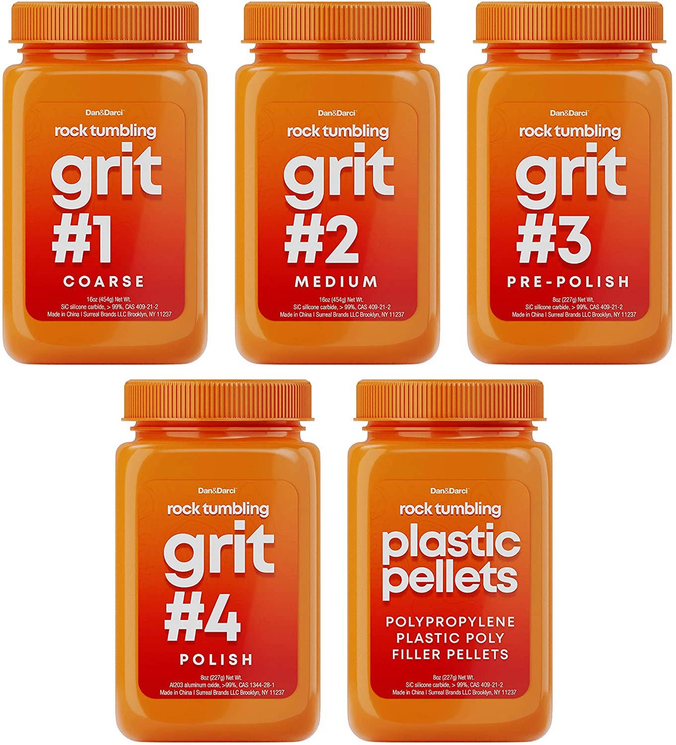 Five orange plastic containers labeled "rock tumbling grit" are arranged in two rows, with the top row showing Dan&Darci Grit Refill #1 Coarse, Grit Refill #2 Medium, and Grit Refill #3 Pre-Polish. The bottom row displays Dan&Darci Grit Refill #4 Polish and plastic pellets for filler to enhance your rock polishing process and create gems effortlessly.