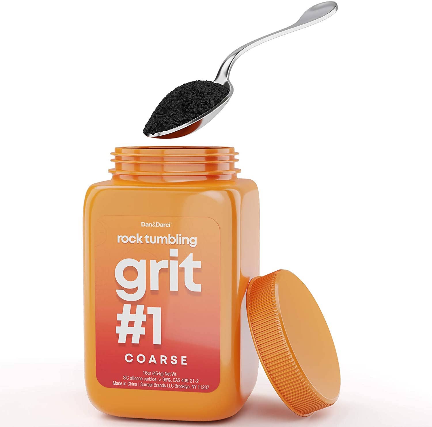 An image shows an orange container labeled "Dan&Darci Grit Refill #1 COARSE" with its lid off and placed beside it. A metal spoon hovers over the open container, filled with coarse black grit. The 1.94 lbs (480 grams) of rock polish is ideal for creating gems or refilling bottles for your next project.