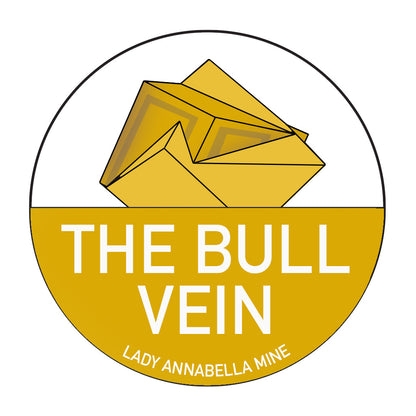 The Lady Annabella Passport Stickers from The Crystalary feature a circular logo with a yellow and brown geometric shape resembling a cube at the top. Below the logo, there's a vibrant yellow background with white text stating "THE BULL VEIN," and smaller text underneath reading "LADY ANNABELLA MINE." This design makes for striking full-color stickers.