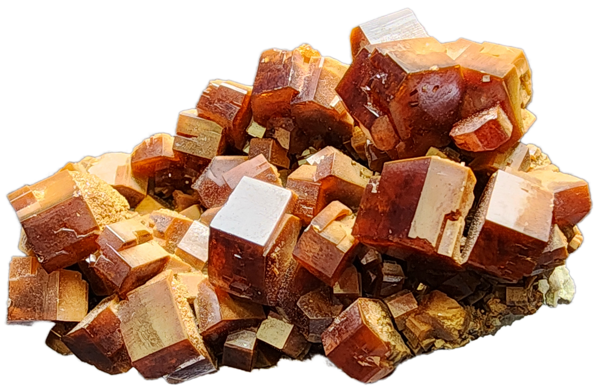 A close-up view of the Vanadinite from The Crystalary, sourced from the Mibladen mining district in Midelt Province, Drâa-Tafilalet Region, Morocco (sku 3076). This piece showcases a cluster of reddish-brown crystals with rectangular shapes, layered to reveal a shiny and reflective surface. The image emphasizes the intricate geometric patterns and textures of this stunning mineral specimen.